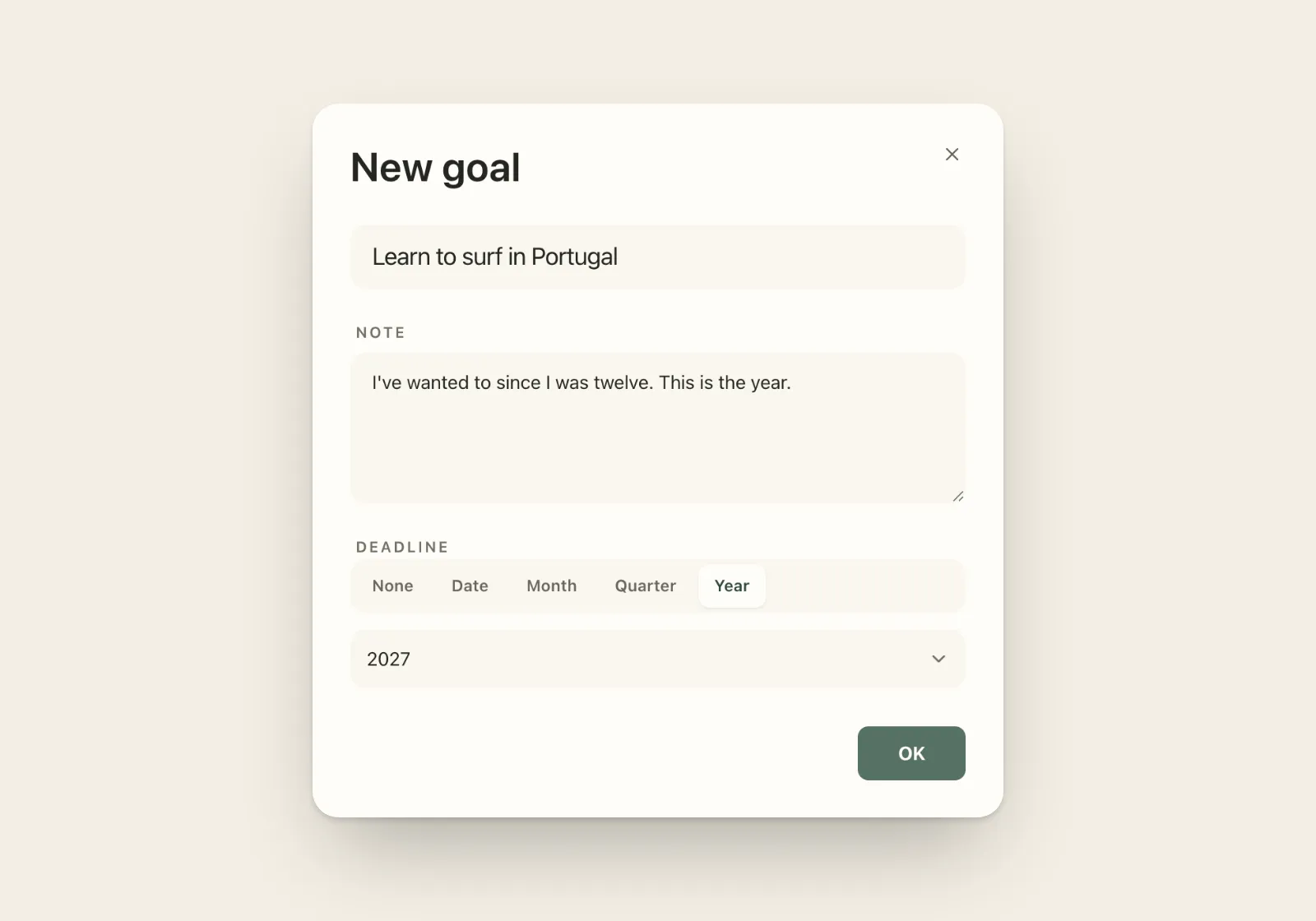 Plannedo's New goal form with the title 'Learn to surf in Portugal', the note 'I've wanted to since I was twelve. This is the year.' and the deadline set to Year 2027.
